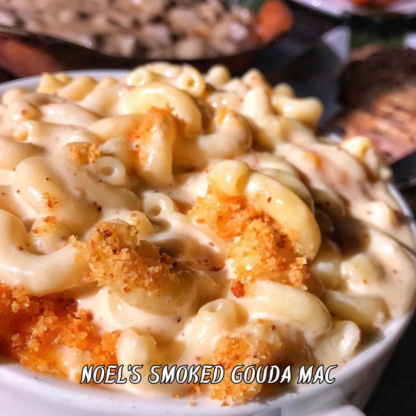 Noel's Smoked Gouda Mac, a creamy pasta dish topped with golden breadcrumbs.