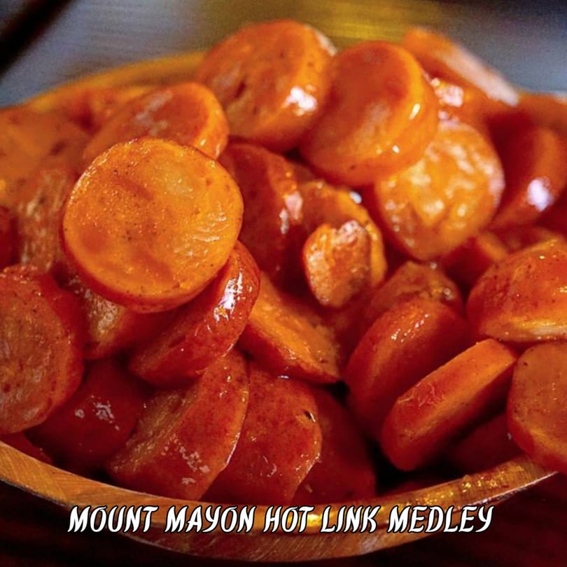 Glossy, sliced Mount Mayon Hot Link Medley served in a rustic bowl.